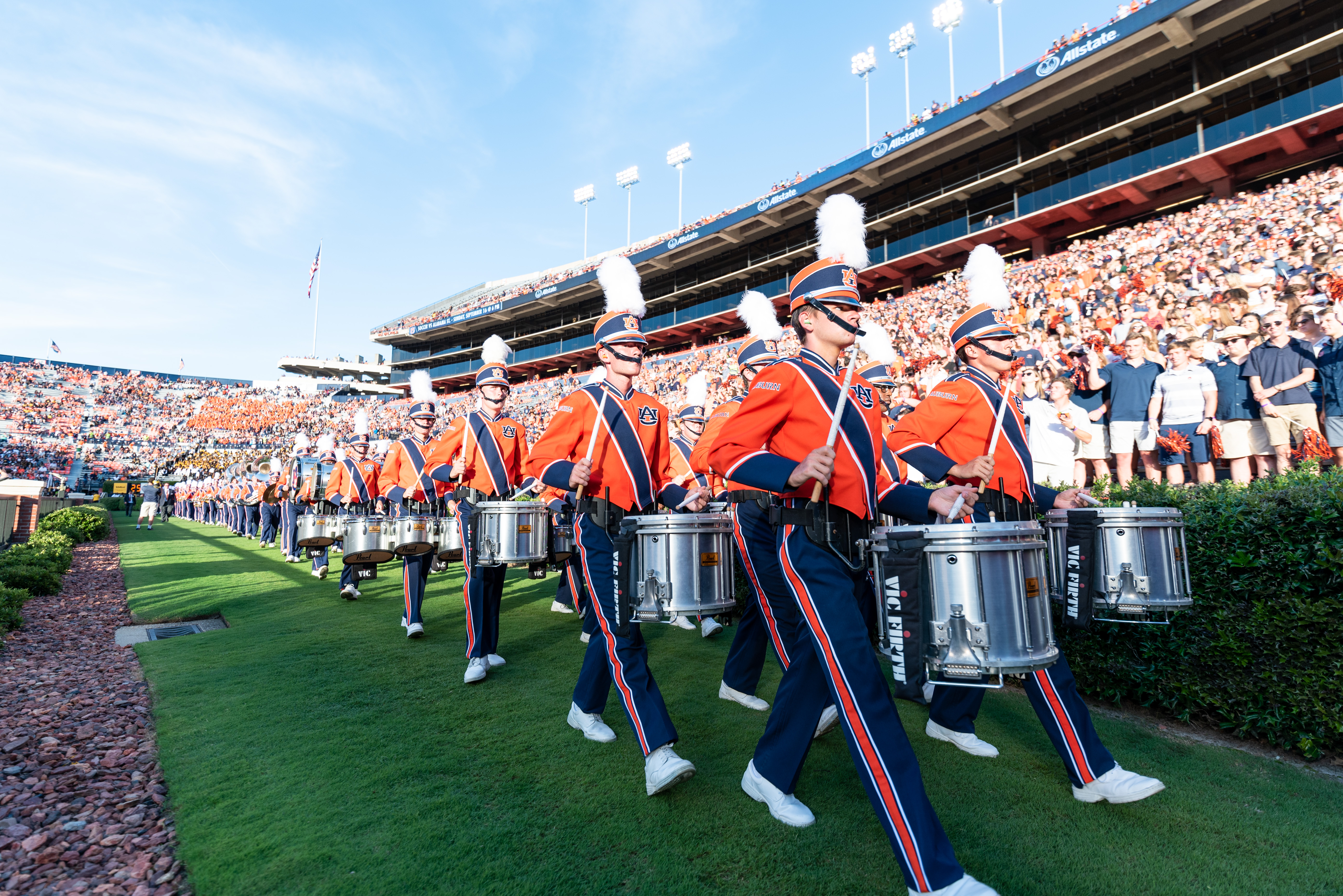 members of the AUMB drumline in stadium