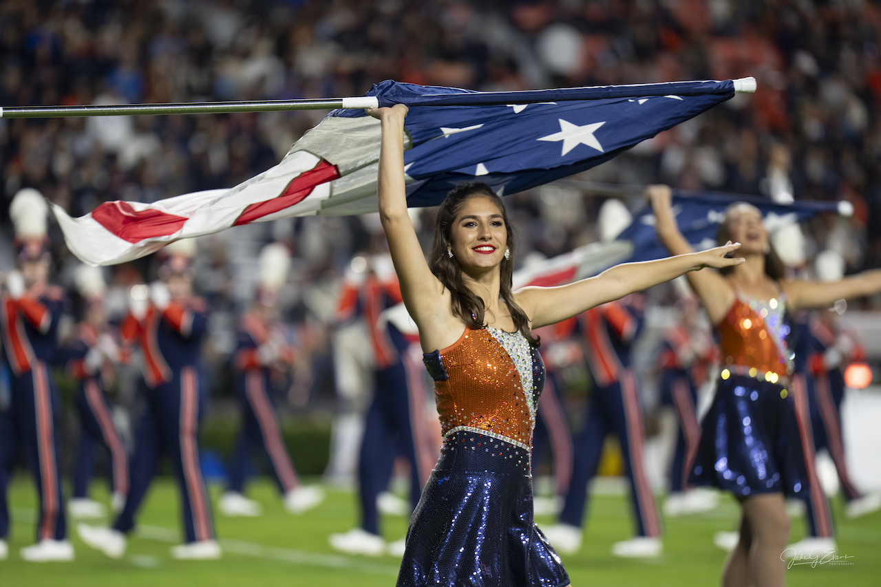 Tiger Eyes Flagline member performing in Jordan-Hare stadium